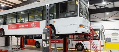 GTG bus raised on ramps