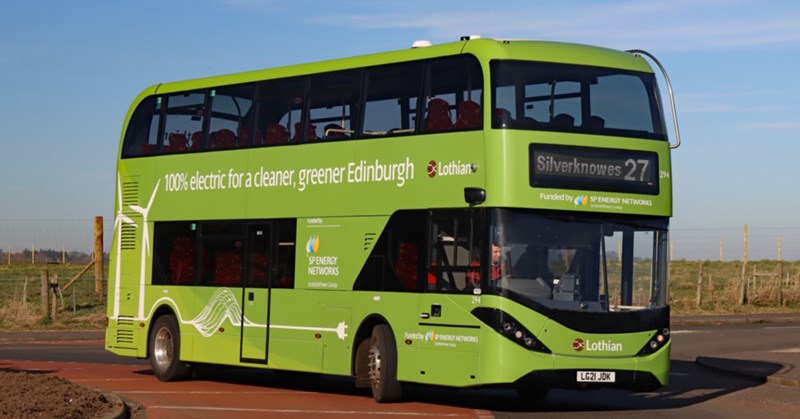 Green Lothian double decker bus